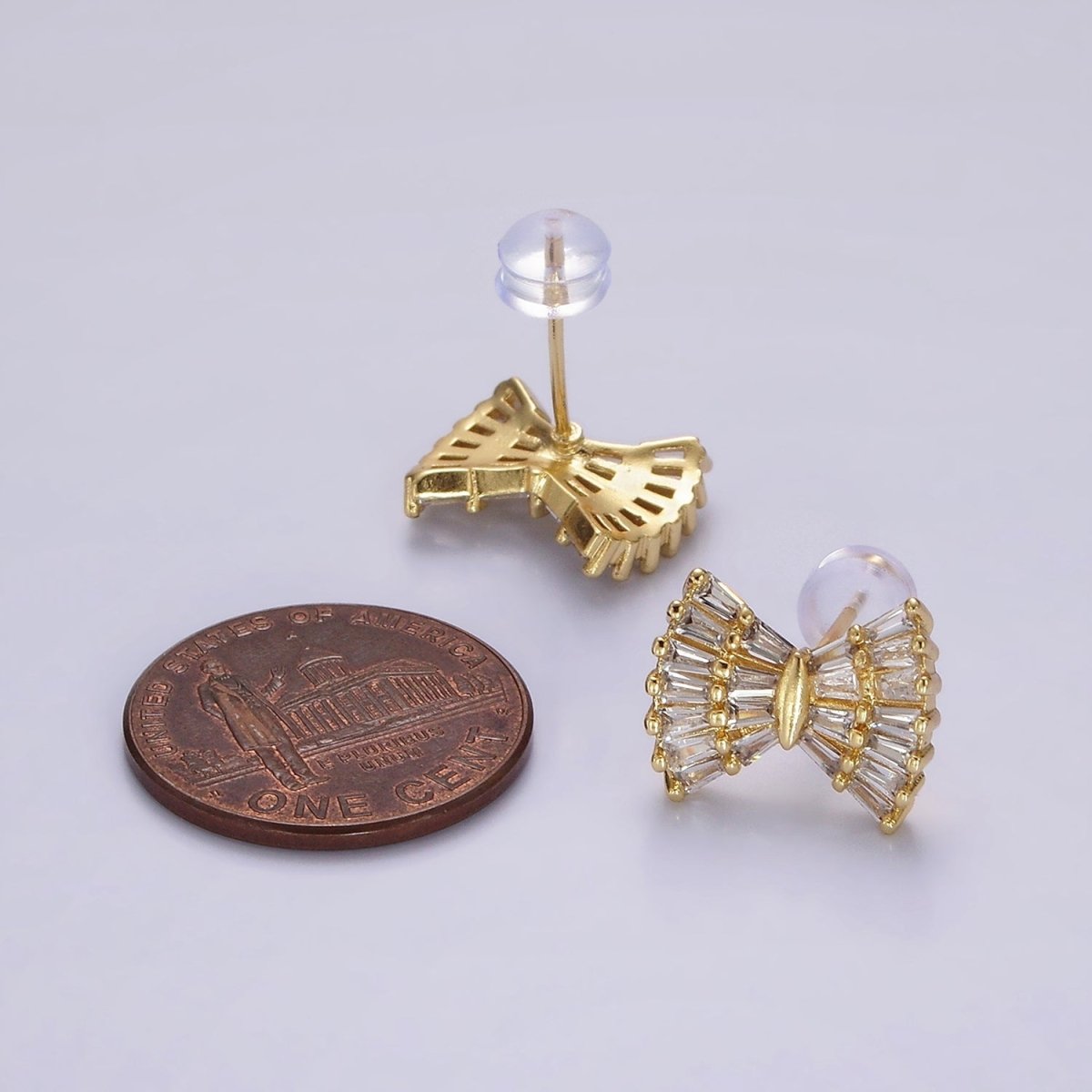 14K Gold plated Clear CZ Baguette Bow Ribbon Stud Earrings | AE138 - DLUXCA