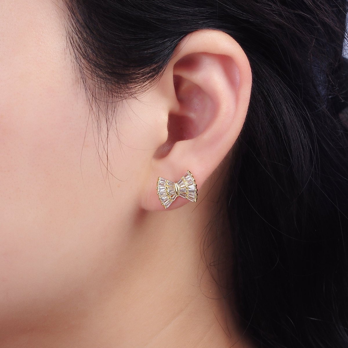 14K Gold plated Clear CZ Baguette Bow Ribbon Stud Earrings | AE138 - DLUXCA