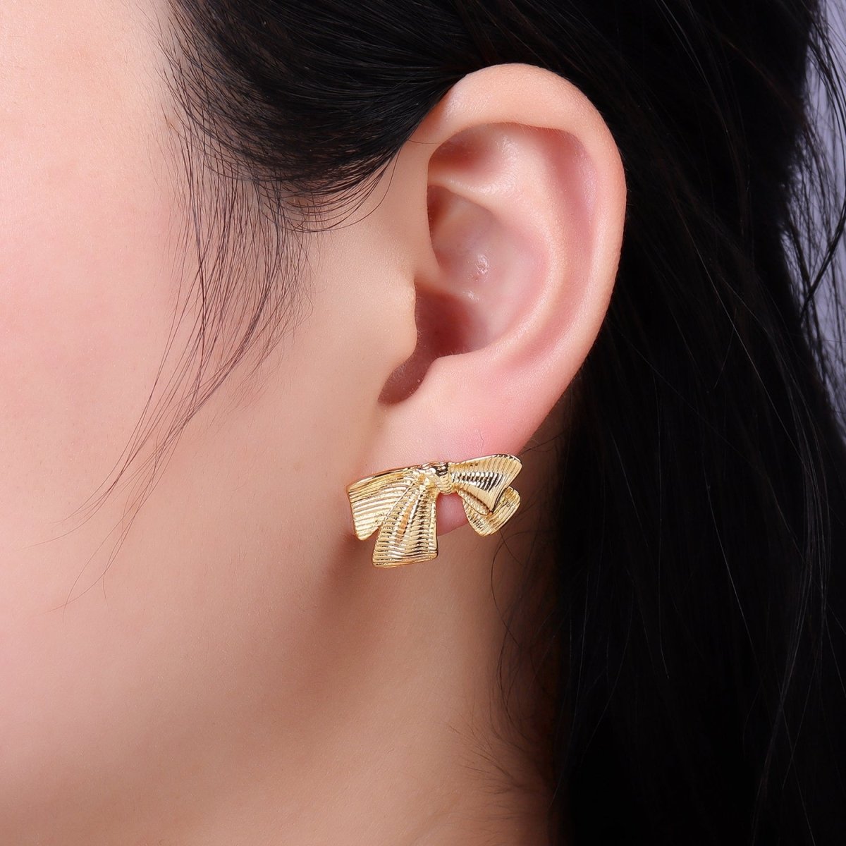 14K Gold plated Line-Textured Ribbon Bow Stud Earrings | P503 - DLUXCA