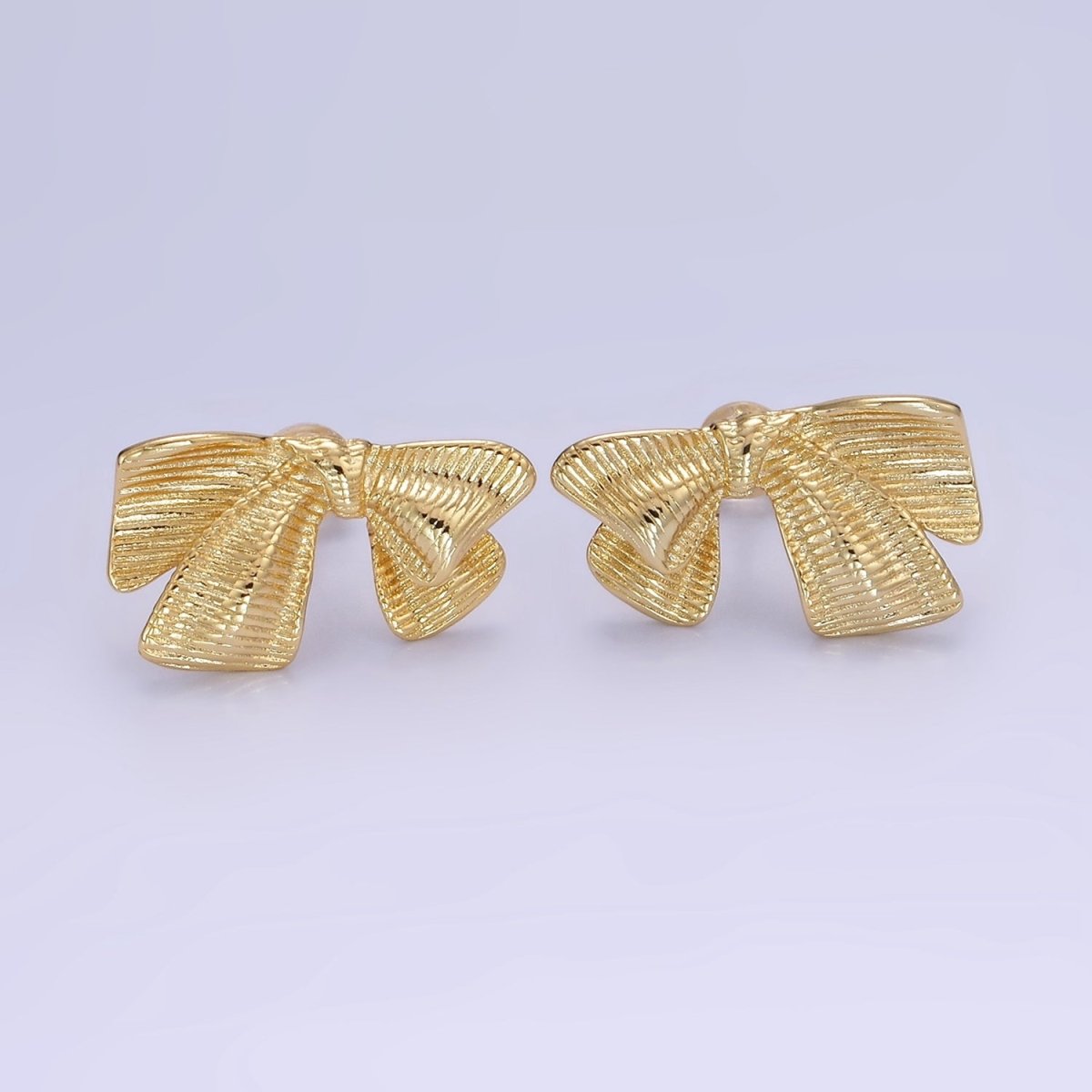 14K Gold plated Line-Textured Ribbon Bow Stud Earrings | P503 - DLUXCA