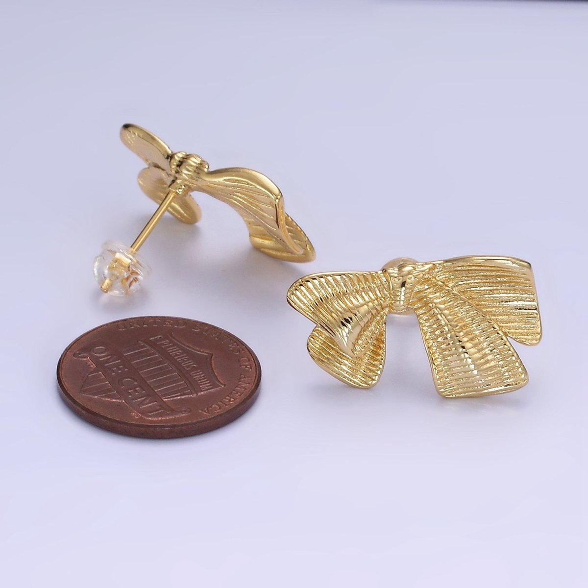 14K Gold plated Line-Textured Ribbon Bow Stud Earrings | P503 - DLUXCA