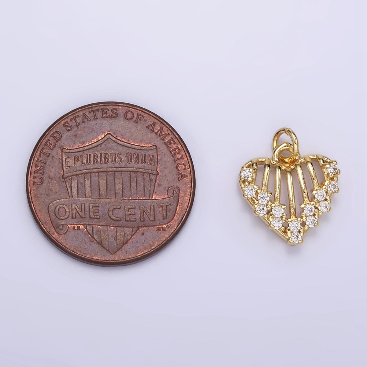 16K Gold plated Open Caged Heart Micro Paved CZ Charm in Gold & Silver | M115