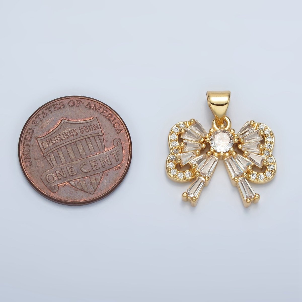 24K Gold plated Bow Ribbon Baguette Micro Paved CZ Pendant | I274 - DLUXCA