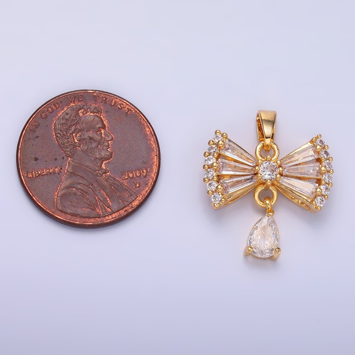 24K Gold plated Bow Ribbon Teardrop Baguette CZ Micro Paved Drop Pendant | AA1436 - DLUXCA
