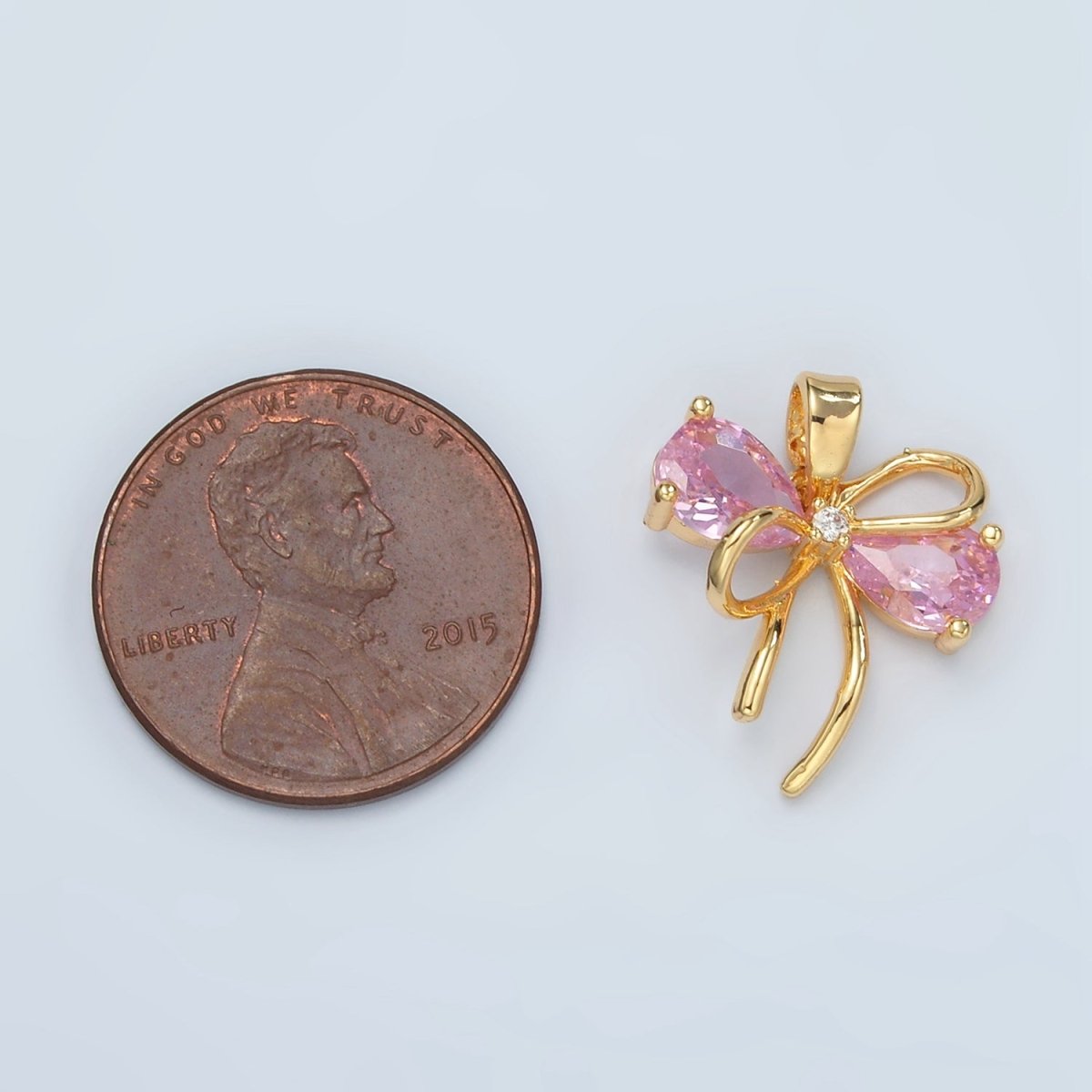 24K Gold plated Clear, Pink CZ Bow Ribbon Pendant | H859 - DLUXCA