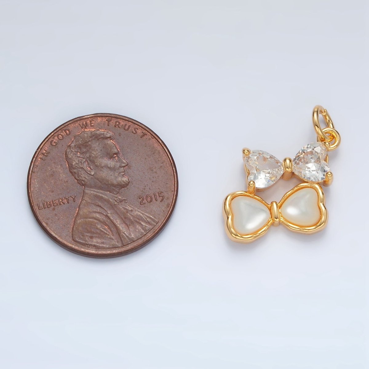 24K Gold plated Double Ribbon Bow Shell Pearl CZ Charm | AG934 - DLUXCA