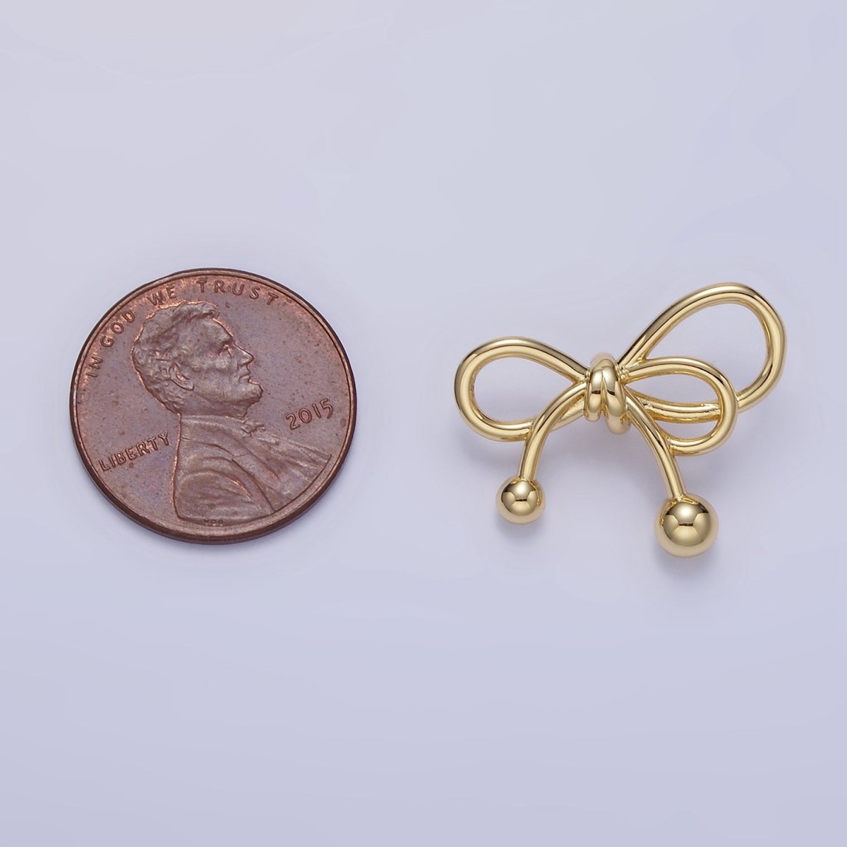 24K Gold plated Double Tied Ribbon Bow Looped Back Pendant in Gold & Silver | H051