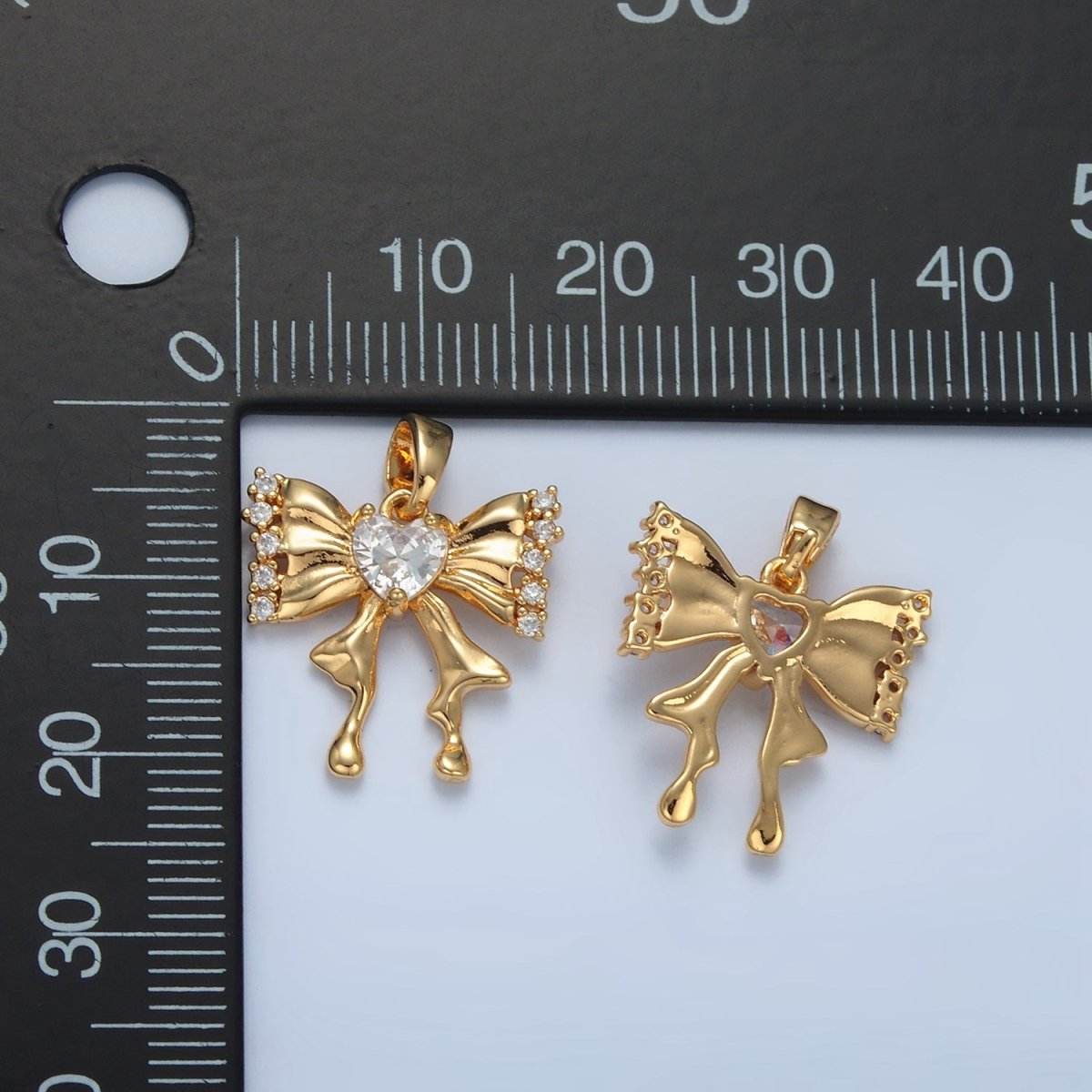 24K Gold plated Heart CZ Molten Ribbon Bow Pendant | AA073 - DLUXCA