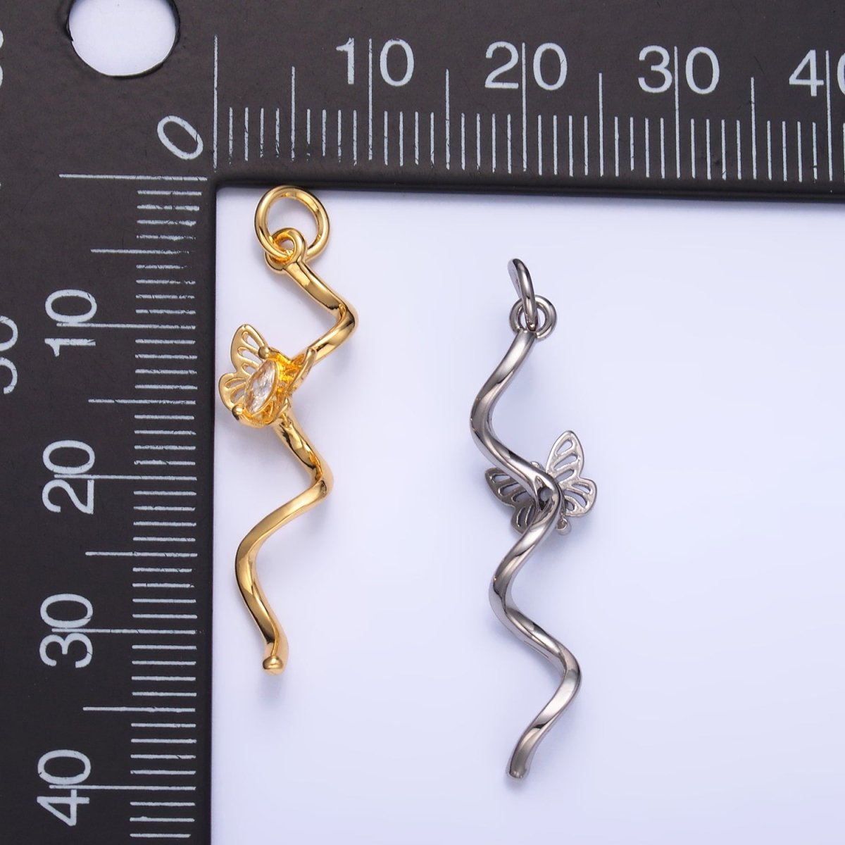 24K Gold plated Marquise CZ Butterfly Curl Charm in Gold & Silver | W448 - DLUXCA