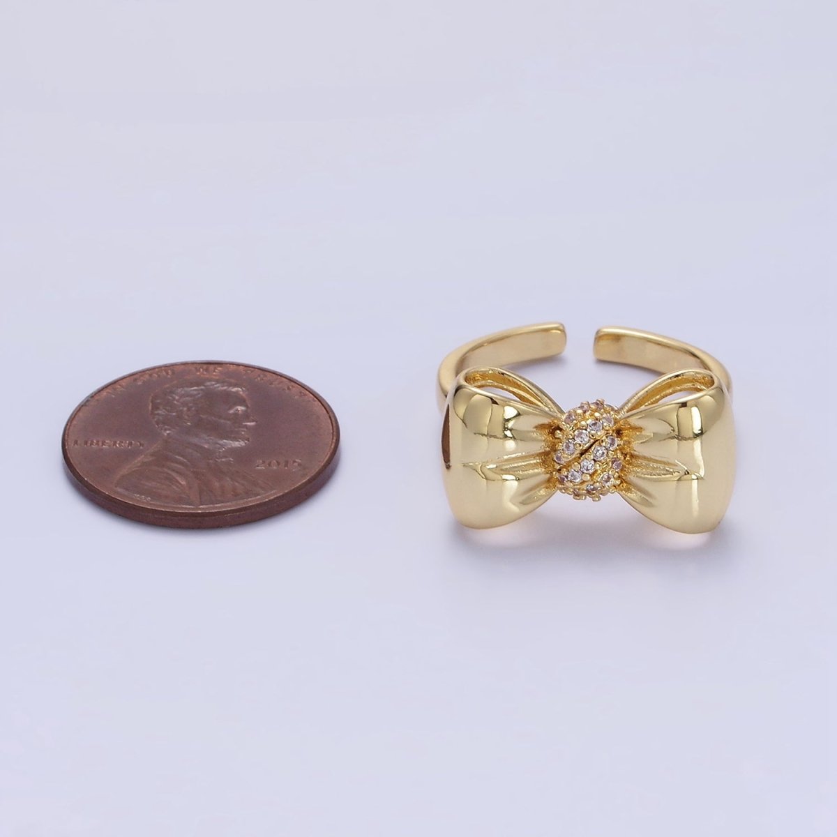 24K Gold plated Micro Paved CZ Puffed Ribbon Bow Ring in Gold & Silver | R150 R151