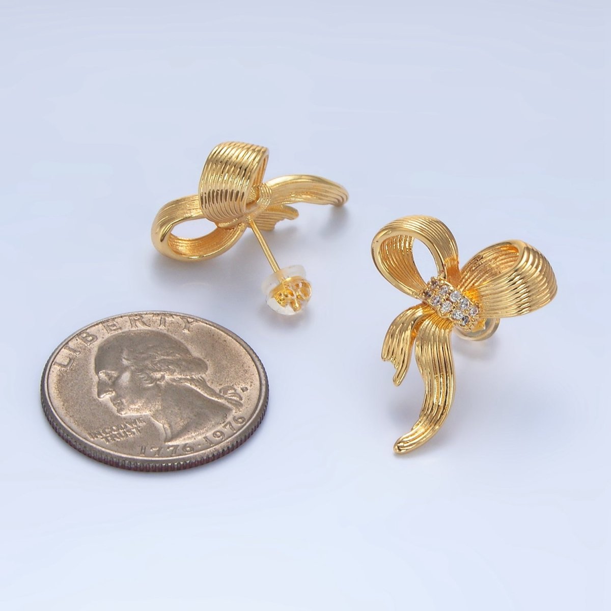 24K Gold plated Micro Paved CZ Ribbed Ribbon Bow Stud Earrings | AD776 - DLUXCA