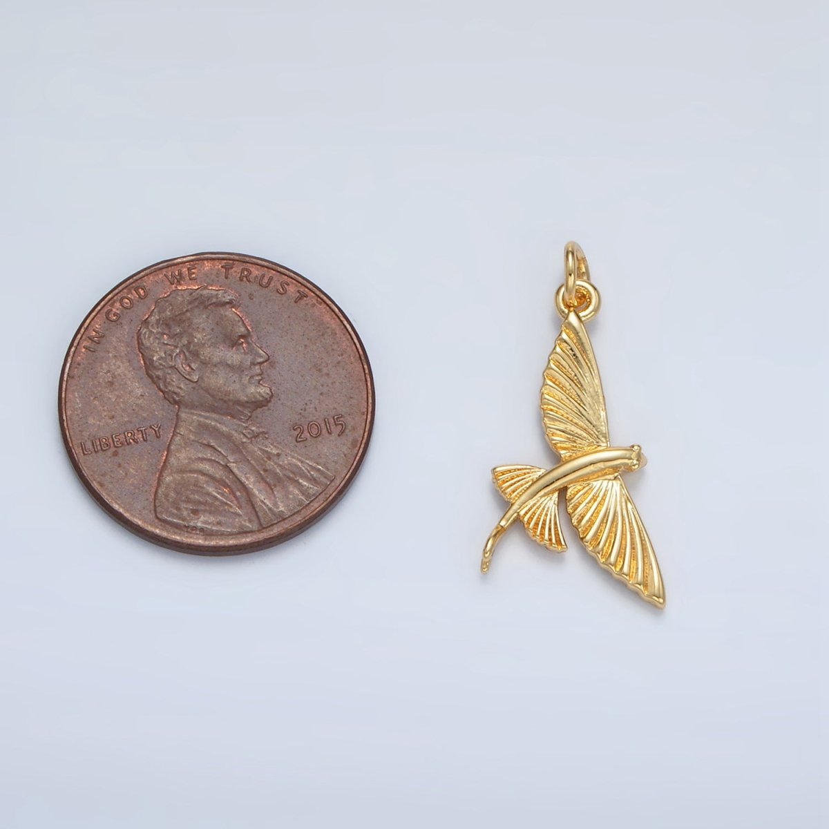 24K Gold plated Minimalist Flying Fish Pet Charm | AC130 - DLUXCA