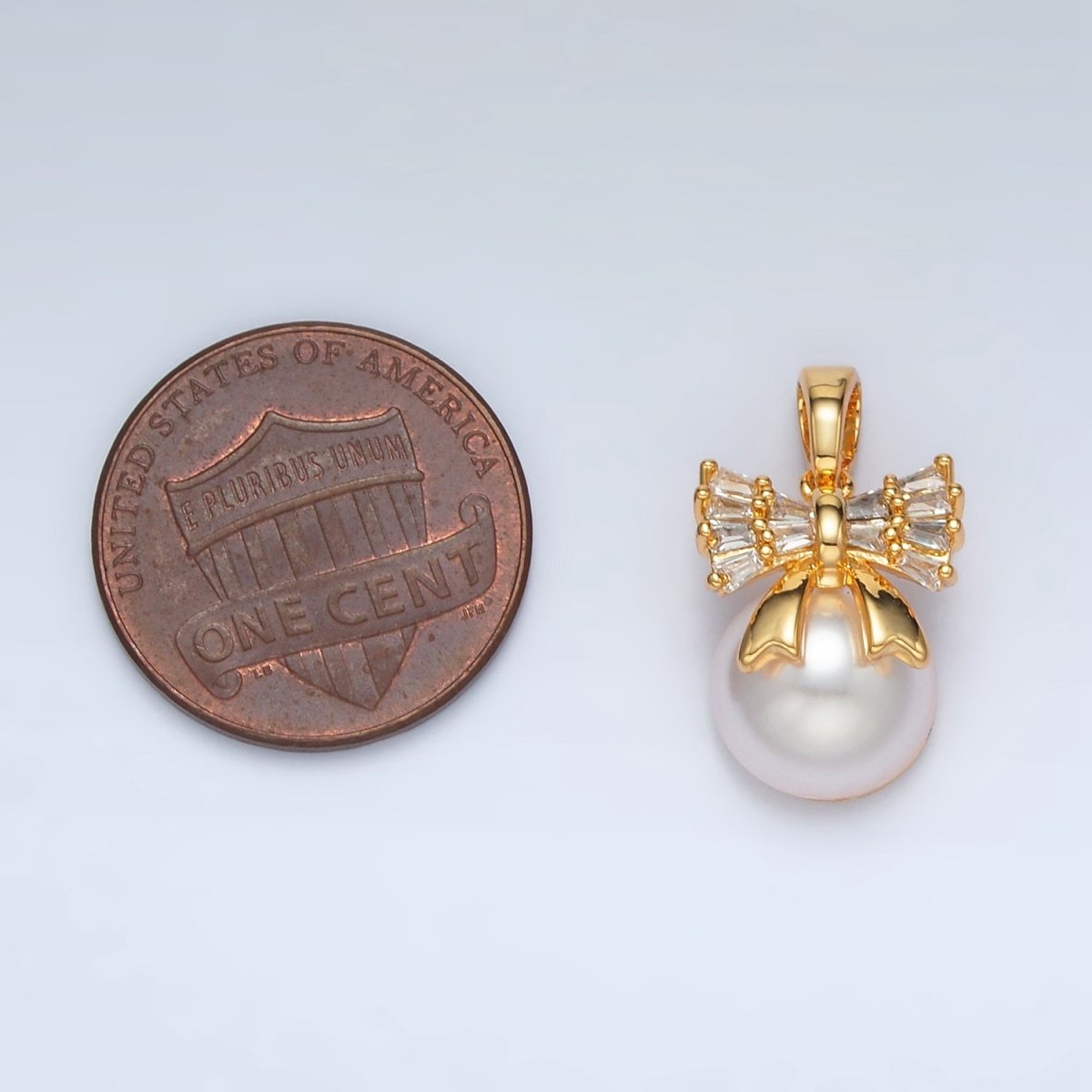 24K Gold plated Ribbon Bow Baguette CZ Pearl Pendant | AA1408 - DLUXCA