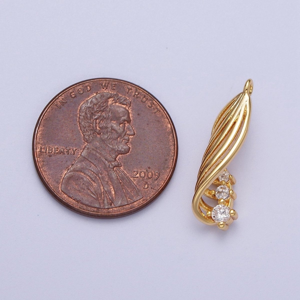 24K Gold plated Twirled Palm Leaf Cubic Zirconia Charm E-420 - DLUXCA