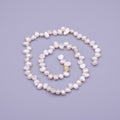 6.7mm - 7.6mm Nugget Seed White Natural Freshwater Pearl 71pcs Full Strand | WA-1317 Clearance Pricing - DLUXCA
