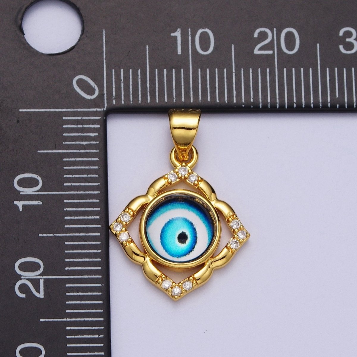 Bright Blue Evil Eye Gold Floral Patterned Pendant, 24K Gold plated Blue Hypnotic Eye of Ra Clear Micro Paved CZ Florette Charm | X-685 - DLUXCA