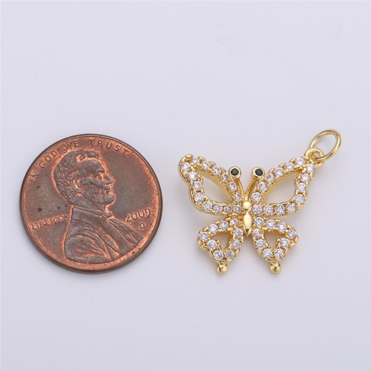 Dainty Gold plated Butterfly Charm D - 777 - DLUXCA