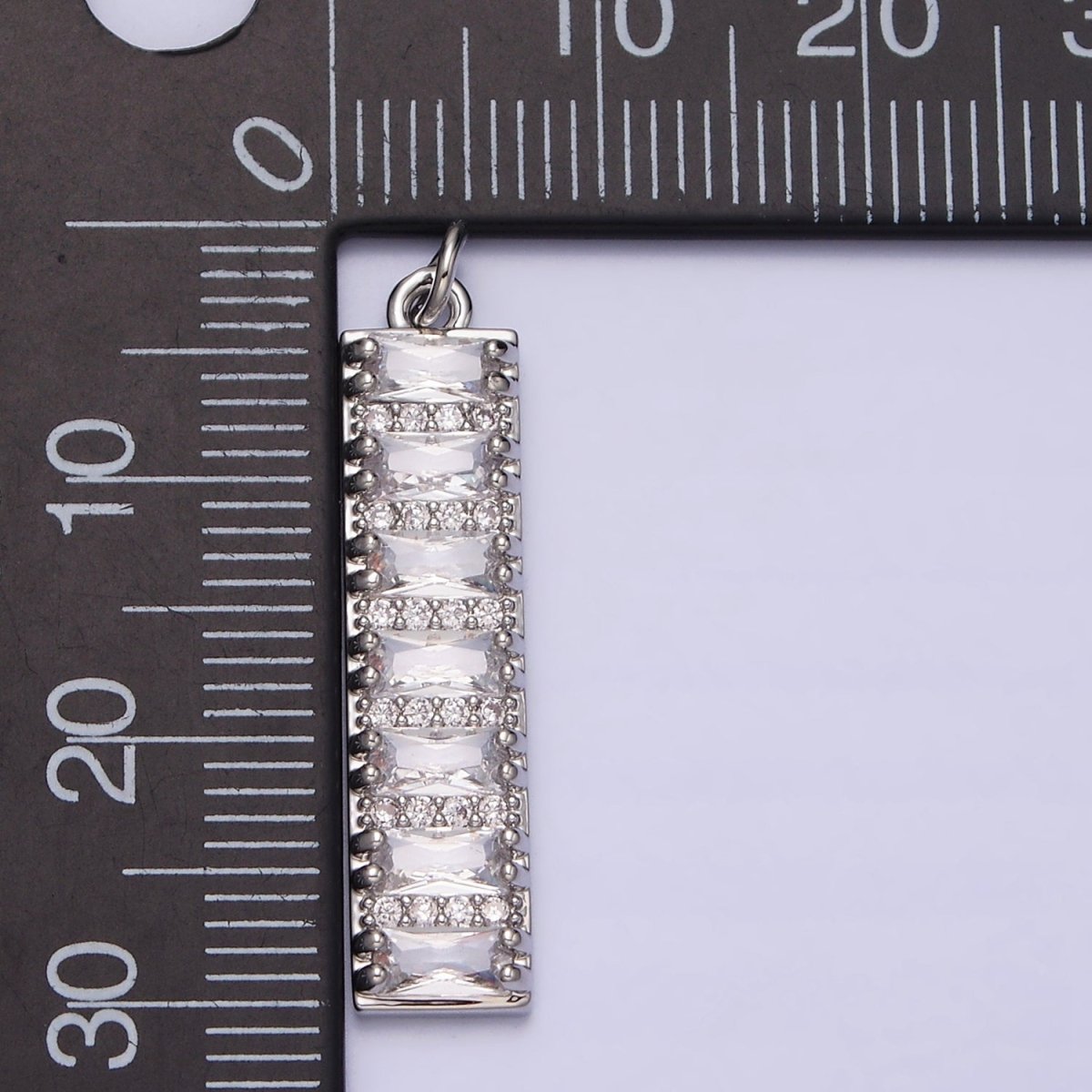 White Gold plated 30mm Clear CZ Baguette Lined Micro Paved Band Tag Charm | AC1306 - DLUXCA