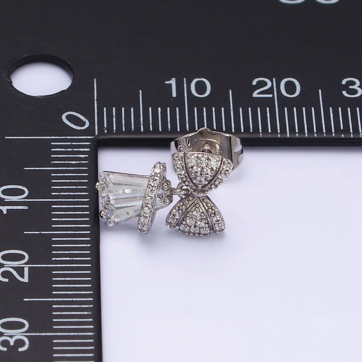 White Gold plated Micro Paved CZ Ribbon Clear Baguette Bell Stud Earrings | AD1454 - DLUXCA